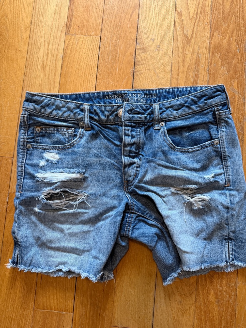 American Eagle Distressed Denim Cutoff Shorts - Blue size 10